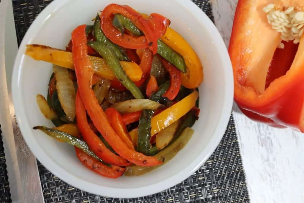 ramekin of colorful sauteed peppers