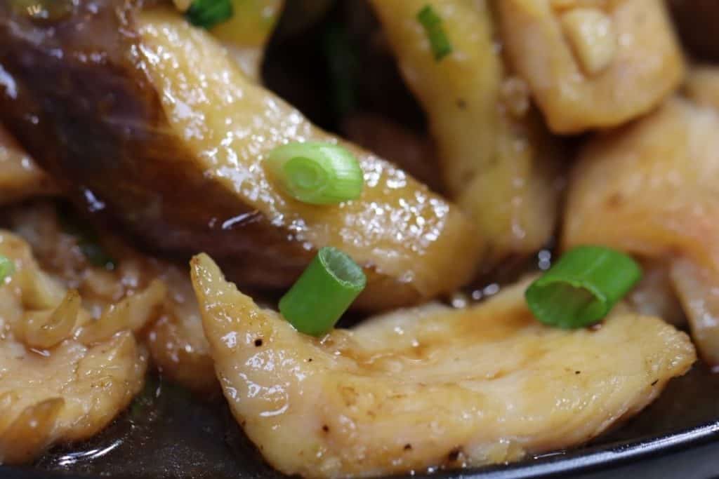 close up of juicy chicken & eggplant stir fry