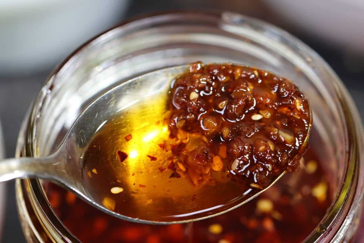 a spoonful of chili oil with sediment
