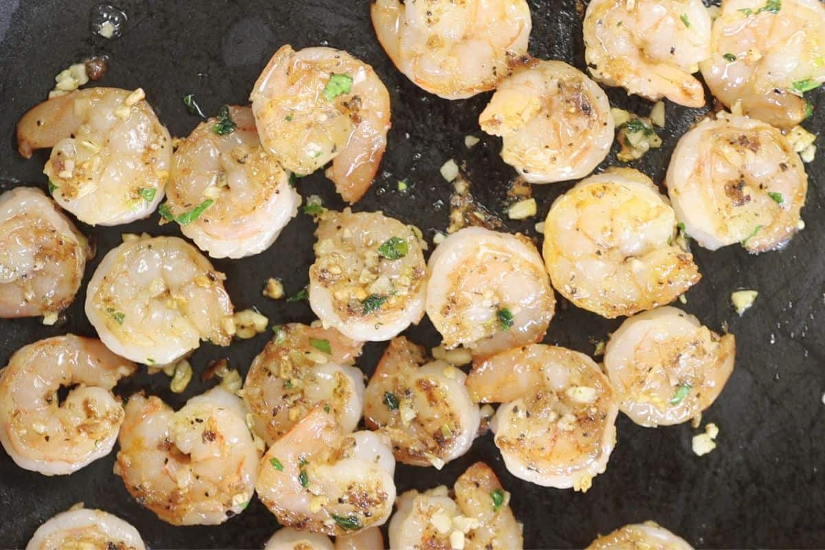 sautee the shrimp with garlic and optional chopped parsley