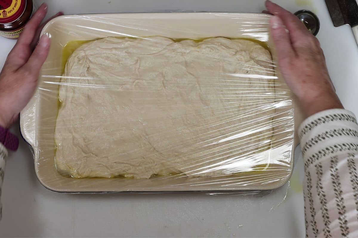 9-steps to making focaccia bread-wrap in plastic and let sit at room temp for 8-12 hours (overnight)