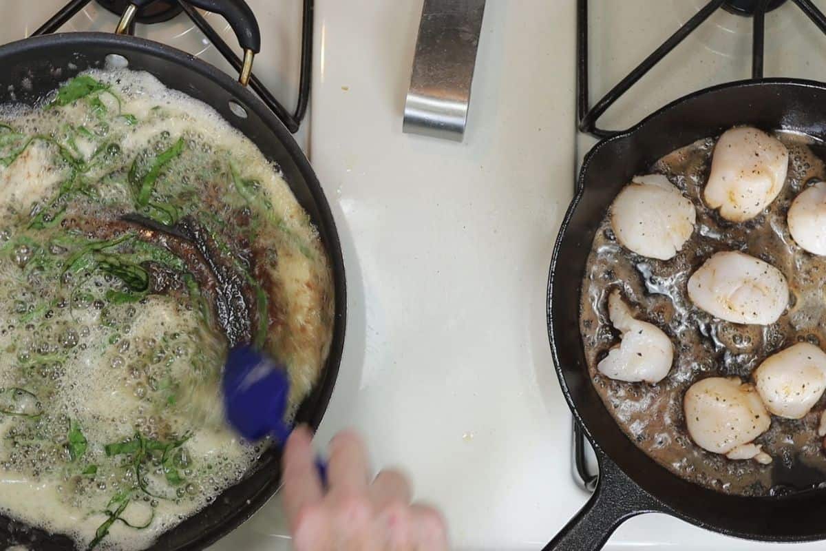 two-pan multitasking: pan sear the sea scallops in one pan while preparing the basil brown butter in the other