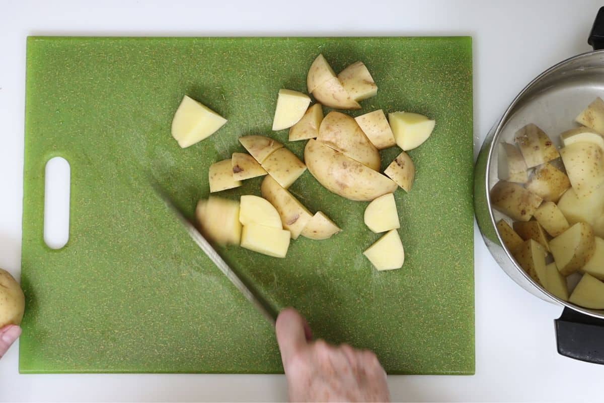 cut potatoes into uniform sized chunks
