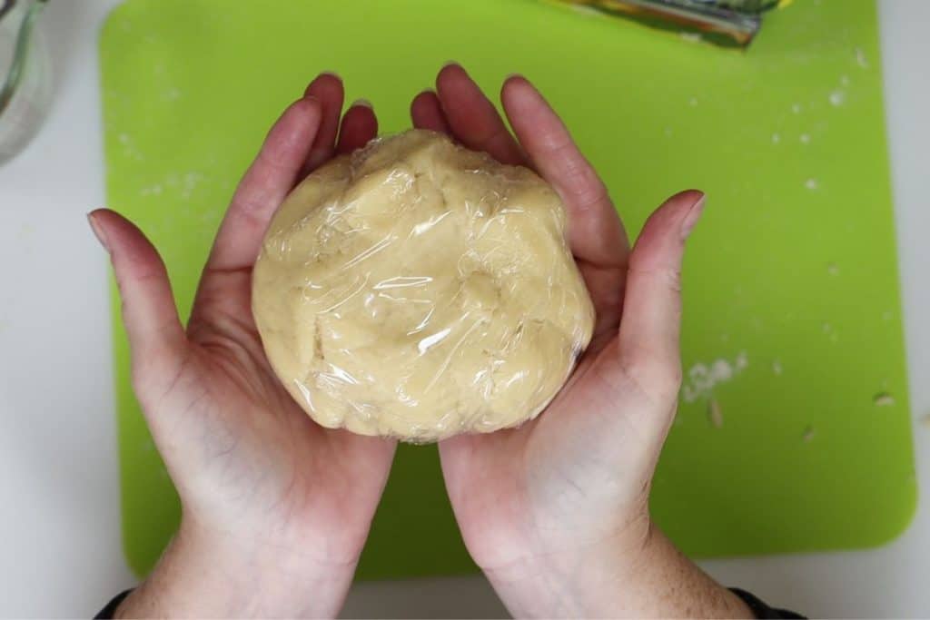 wrap the dough in plastic and chill in freezer before rolling out