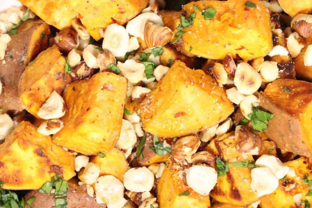 let's take a closer look at these tender and delicious roasted sweet potatoes with toasty hazelnuts.