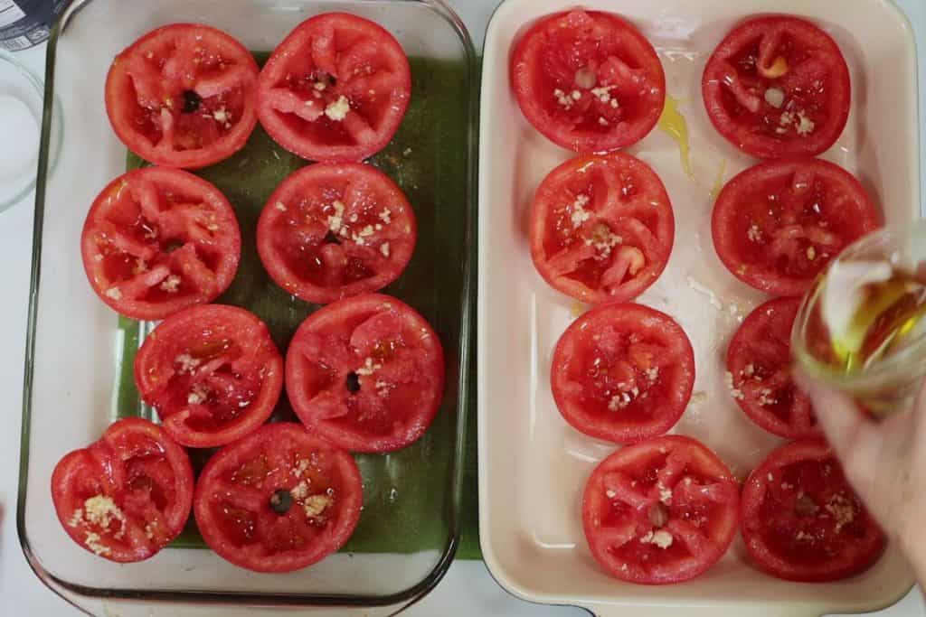 halved and gutted tomatoes with olive oil salt and pepper will roast in the over for an hour