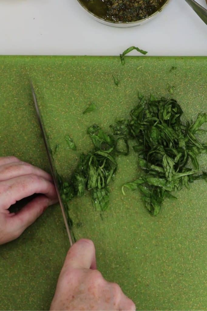 cutting the basil into thin strips is also called chiffonade