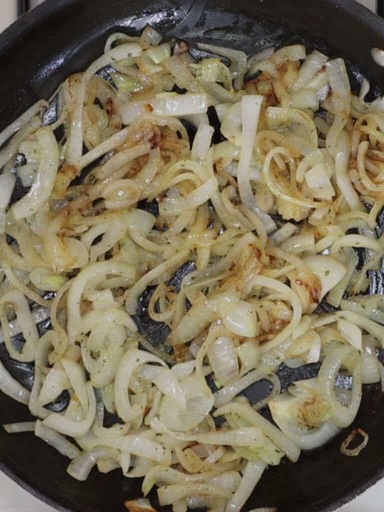 overhead view of cooking the onions at the beginning of the process