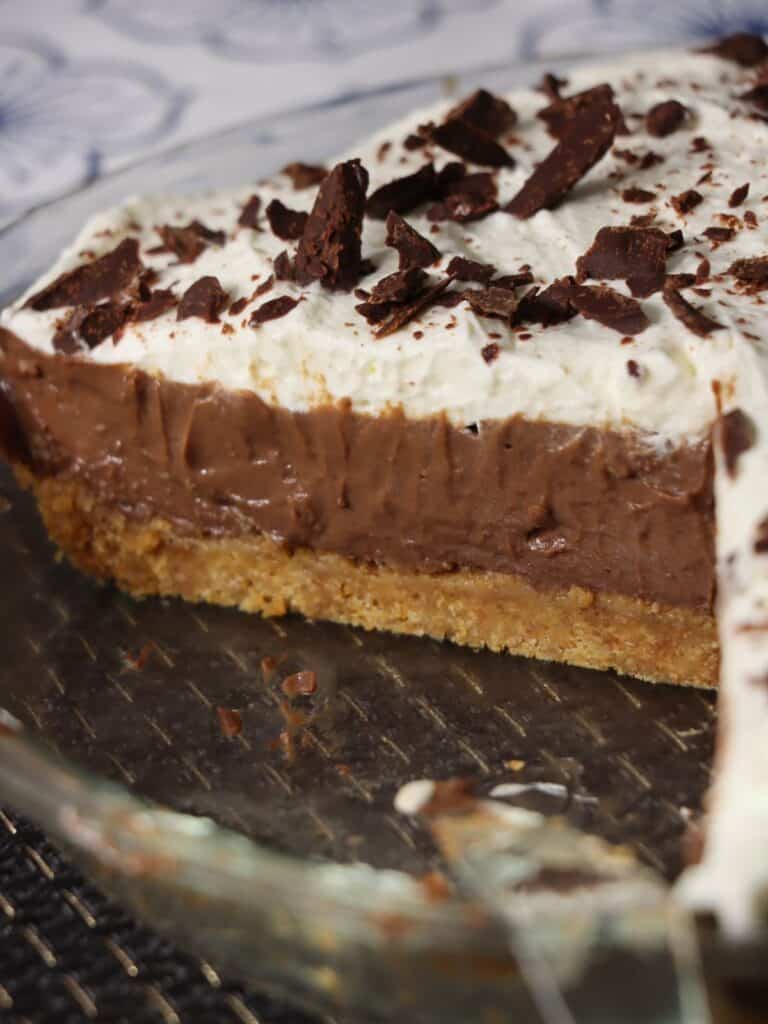 inside look at chocolate cream pie with graham cracker crust