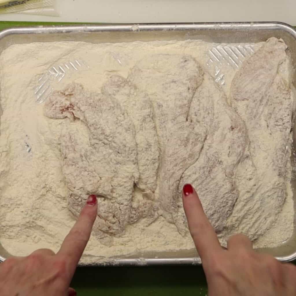 all the chicken cutlets coated in flour