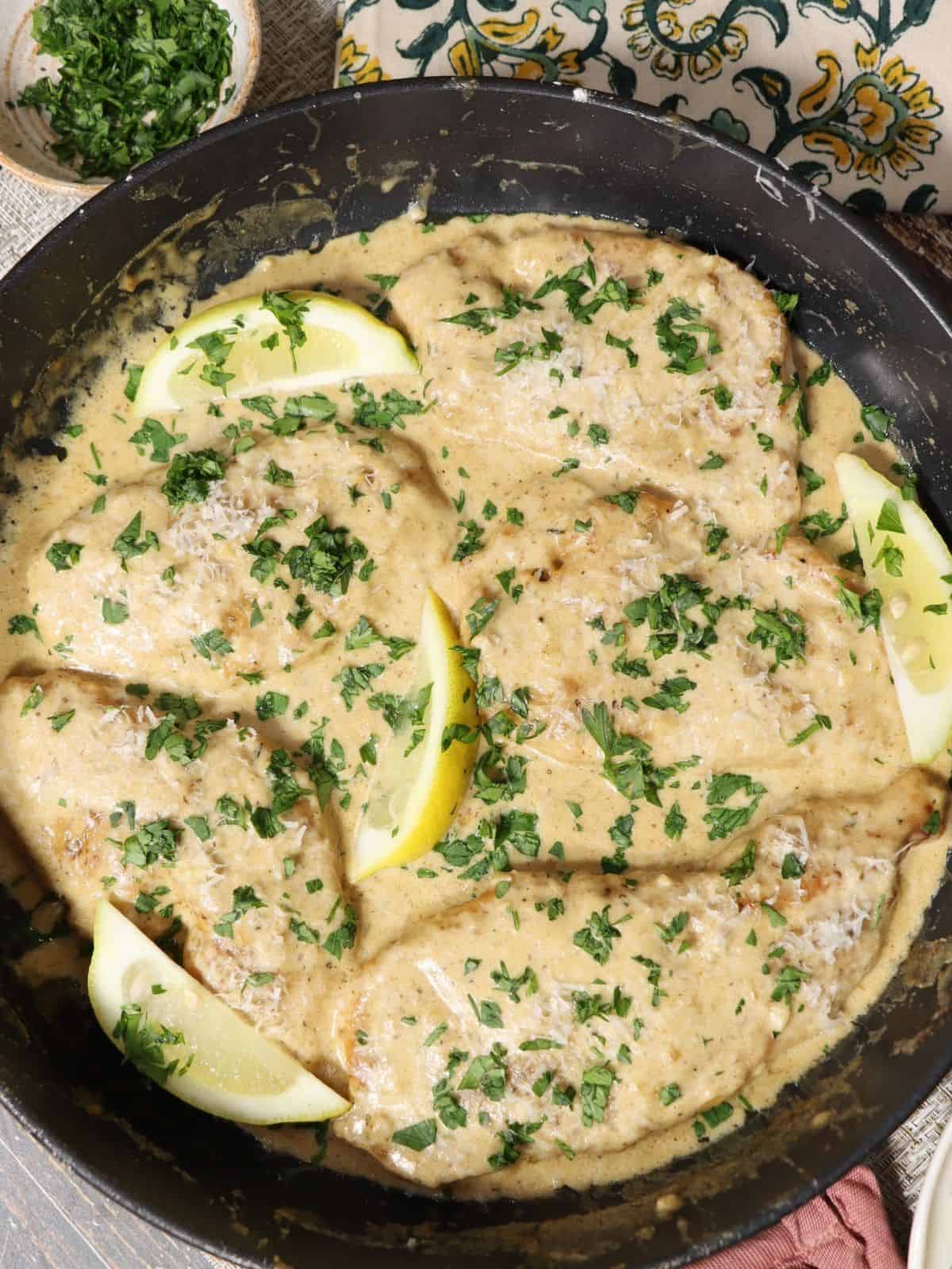 one pan dinner How to make easy and delicious creamy dijon chicken garnished with parsley and lemon