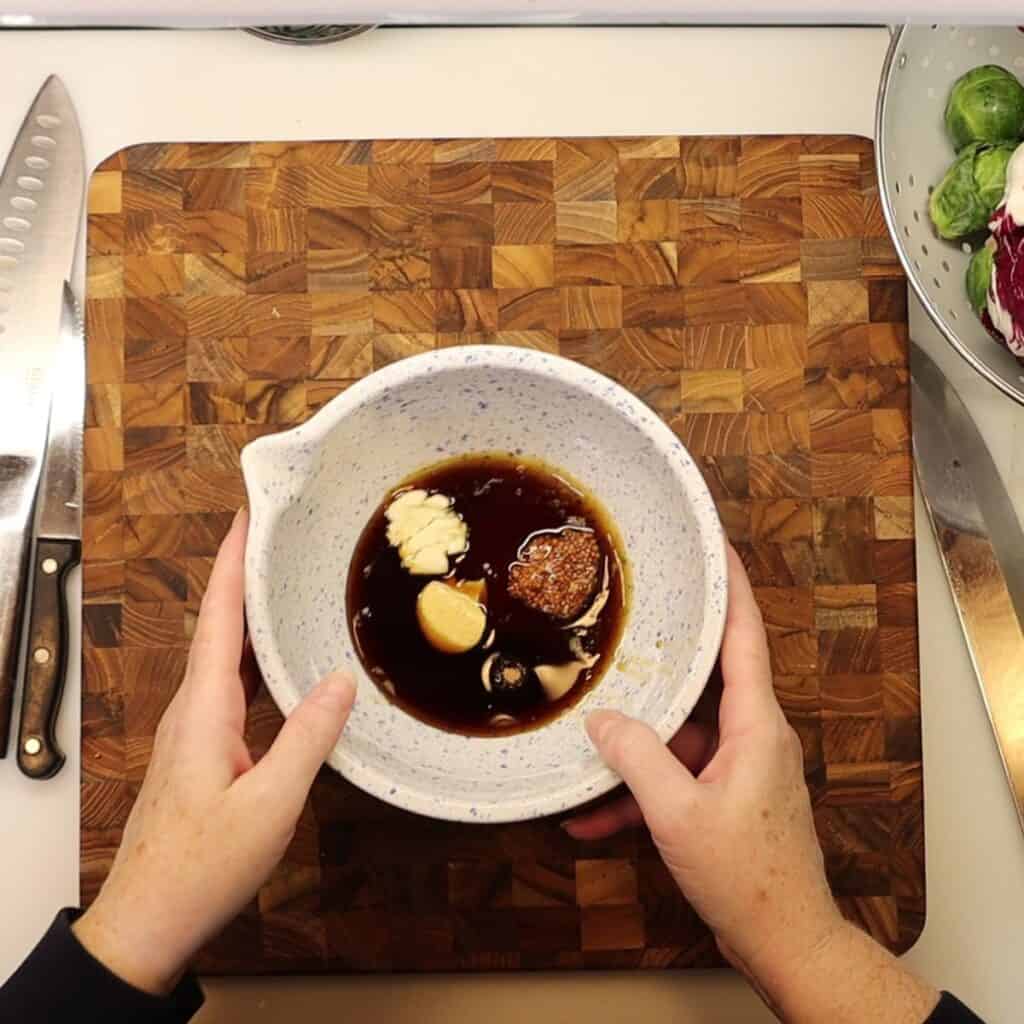 all maple mustard drizzle ingredients in a bowl