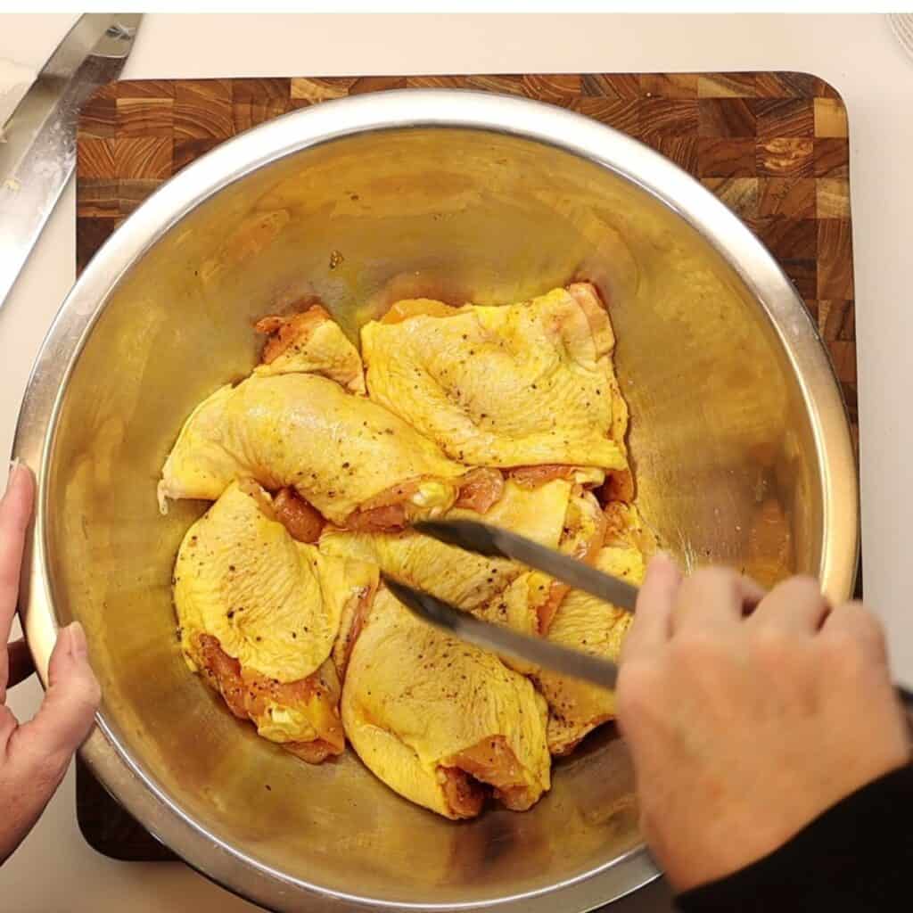 turn chicken to coat in saffron water