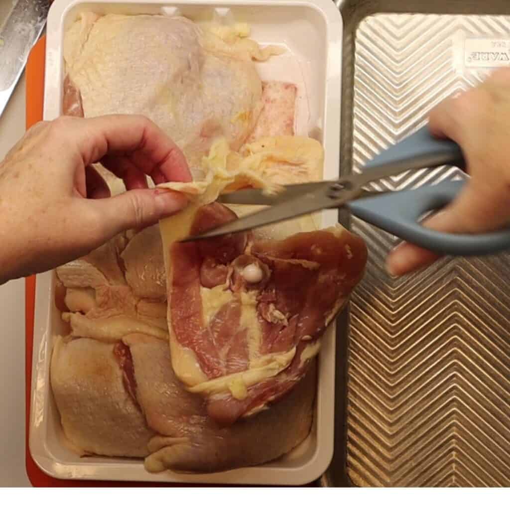 trimming the fat from chicken thighs