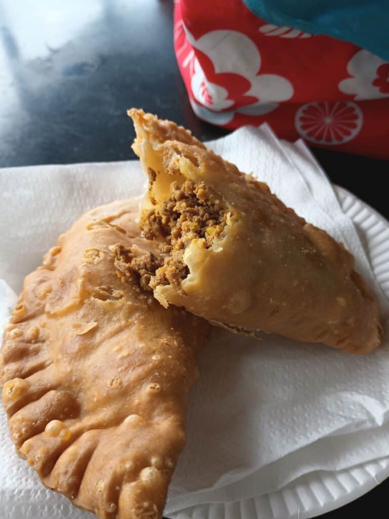 one beef, one chicken puerto rican empanada