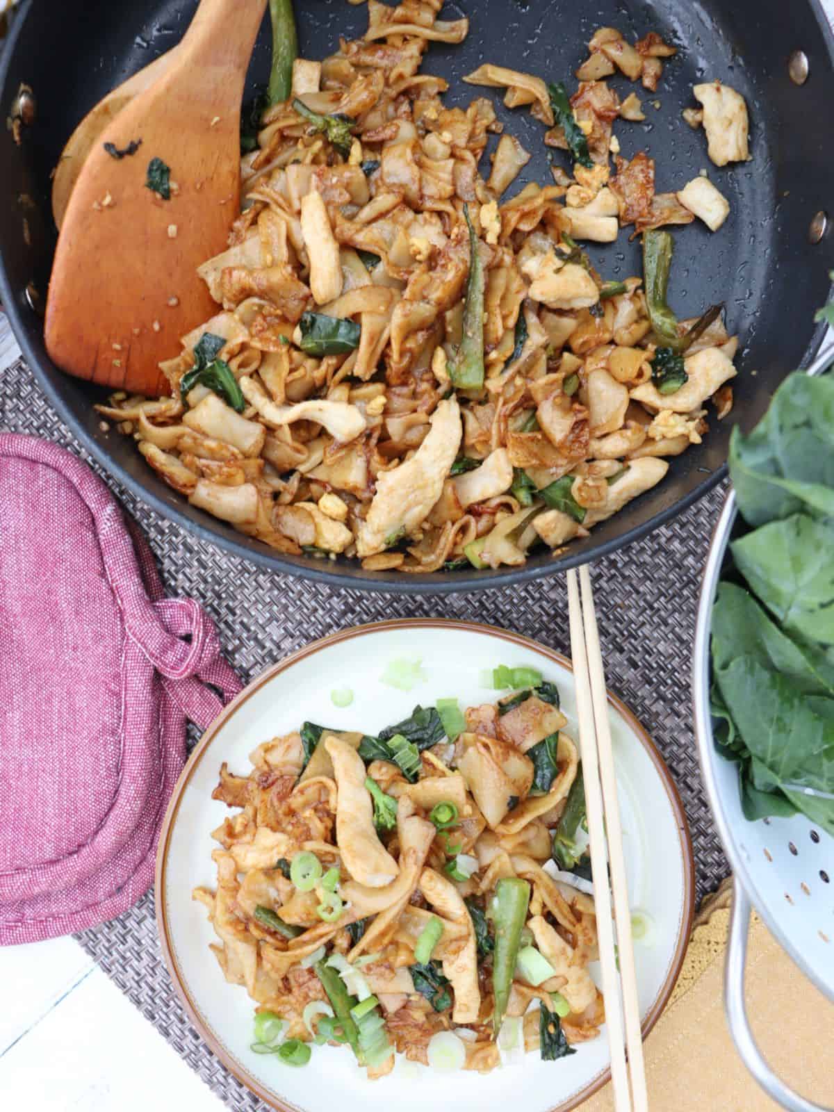 overhead view of Easy Chicken Pad See Ew with chopsticks
